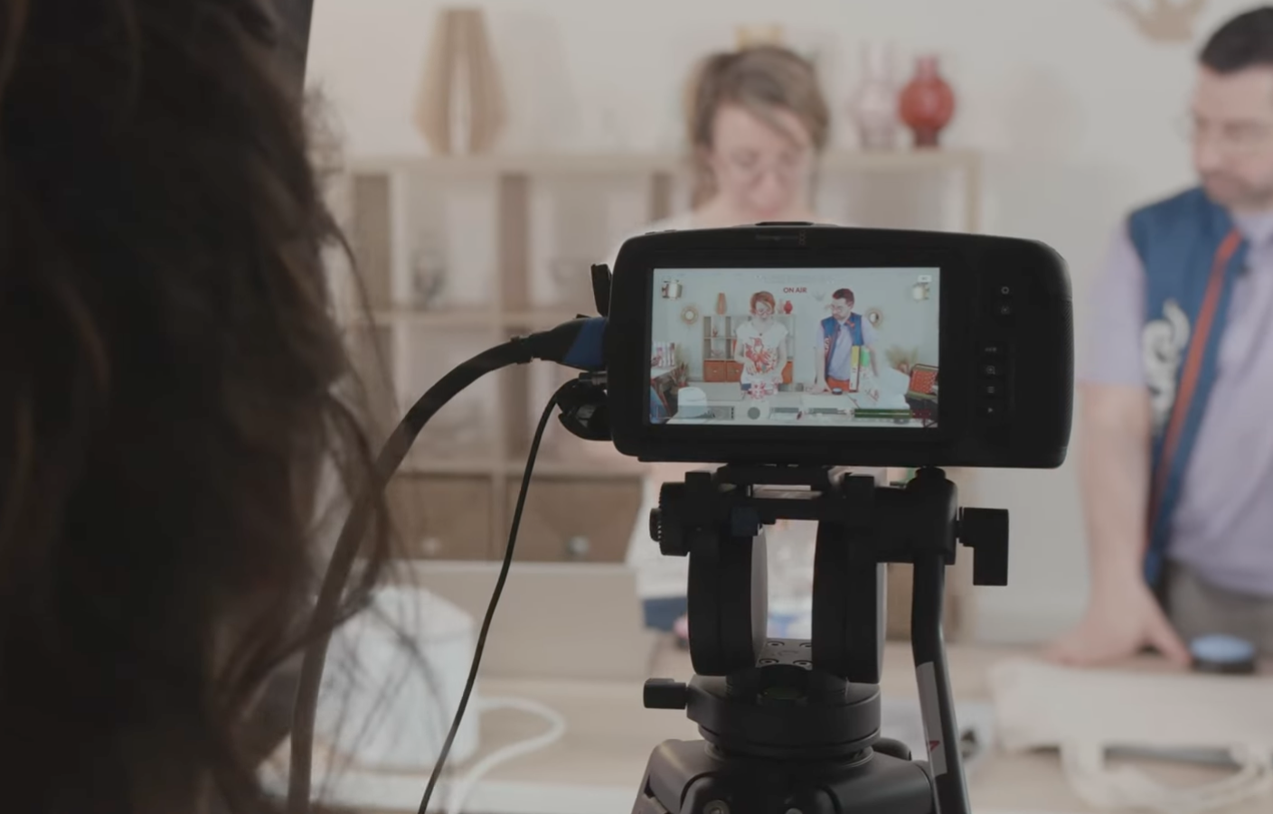 Cultura Live Shopping filming — a pioneer of Live Shopping in its sector in France. A woman in front of a camera in a studio.